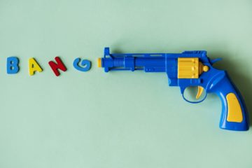 blue and yellow toy gun